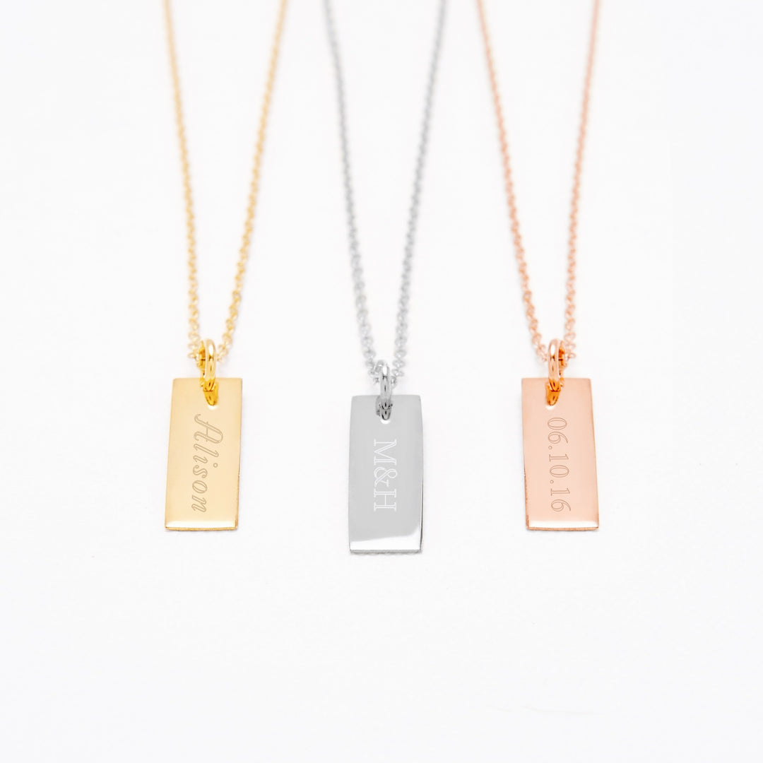 Engravable Petite Vertical Silver Bar Necklace (left to right)