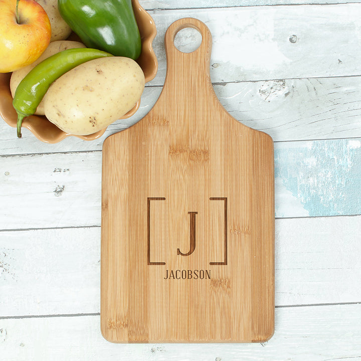 Family Name with Initial Personalized Bamboo Paddle Cutting Board